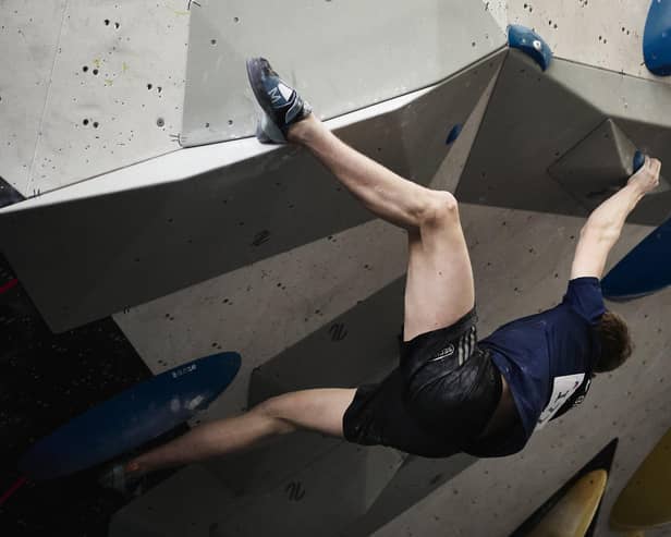 Sam Hammond in climbing action in Italy.