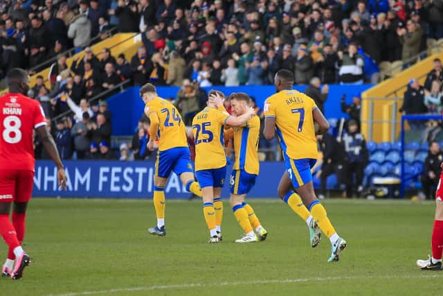 Mansfield Town celebrate the opening goal. Photo credit - Chris & Jeanette Holloway / The Bigger Picture.media