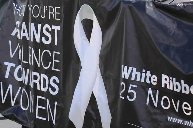 Men are being encouraged to show their support for White Ribbon Day. Photo: Getty Images