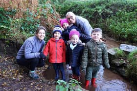Laura Gapski, director of Bright Sparks Nursery - pictured with deputy manager Laura Hammond and some of the children - is leading the campaign against plans for homes off Cauldwell Road, Sutton.