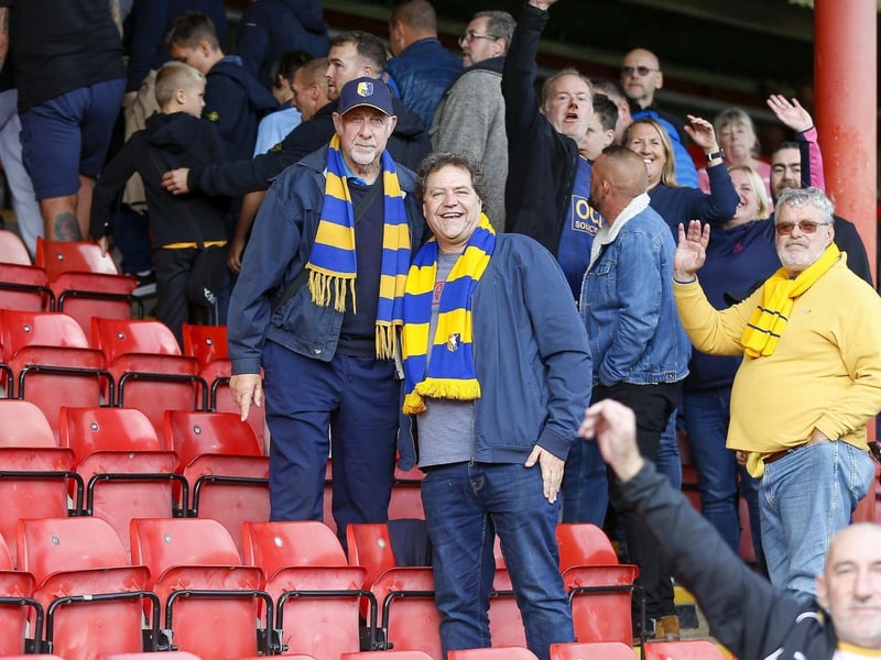 :Stags fans celebrate victory at Gresty Road.