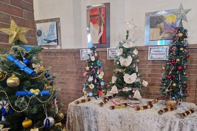 A selection of trees on show at the festival, including one by Rainworth Parish Council, right.