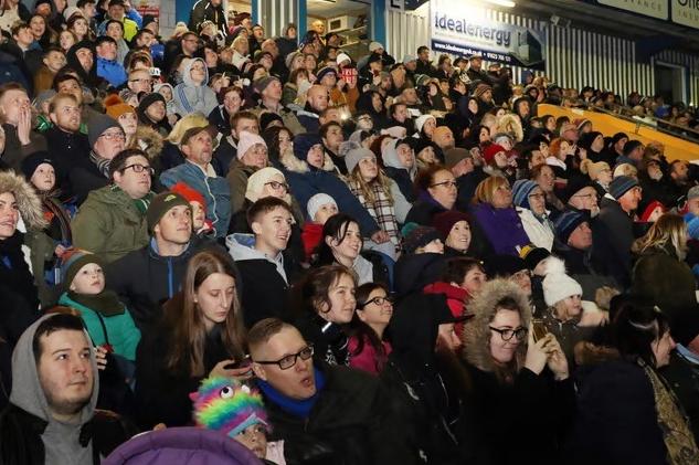 The crowd looks on in awe as brilliant fireworks illuminate the night during the 2017 celebrations