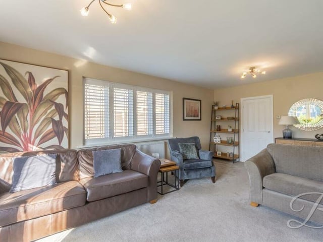 Dual-aspect windows make brightness guaranteed in the living room at the £325,000-plus property. The room is perfect for family gatherings or for putting your feet up after a long day.