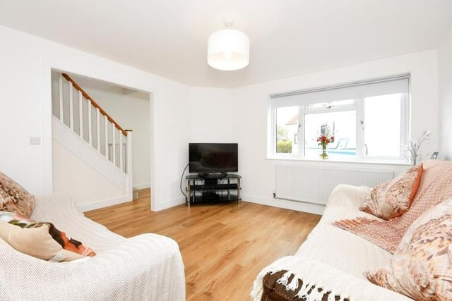 It wouldn't be difficult to enjoy a relaxing evening in this comfortable lounge, which overlooks the front of the Langwith property. As in the kitchen/diner and downstairs toilet, the floor is made up of luxury vinyl tiles in oak effect.