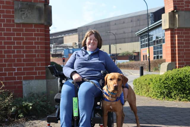 Kym Stretton with support dog Essi