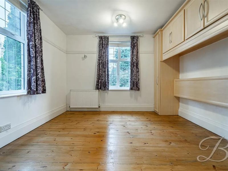Upstairs, you’ll find two generously sized bedrooms, each with the added luxury of its own dressing room.