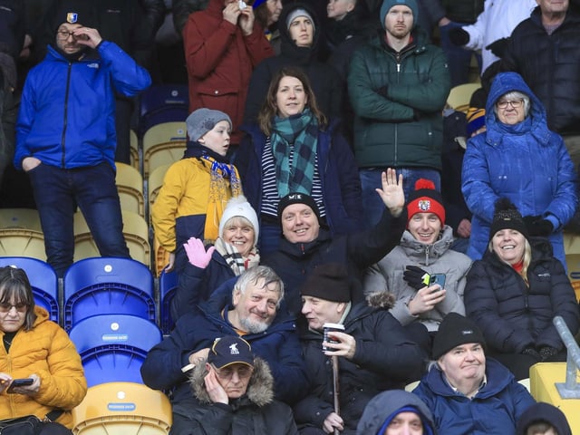 Mansfield Town were beaten by Wrexham to slip nearer the relegation zone.