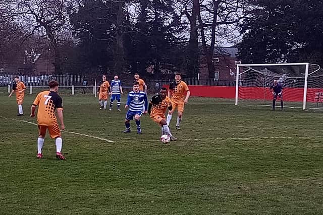 Kofi Appiah brings the ball out on his Clipstone debut.