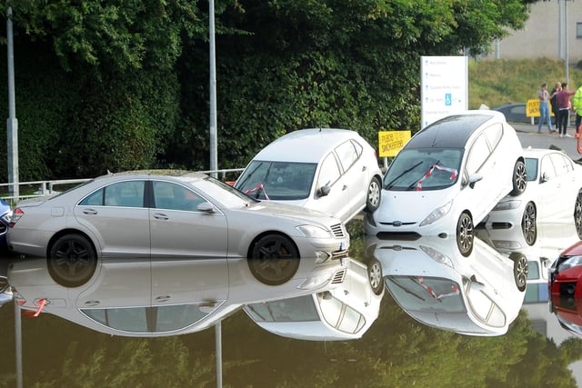 Aftermath of flooding at Victoria Hospital car park.