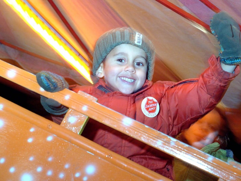Sam Watson, (then four), from Hucknall enjoys one of the fairground rides in 2008.