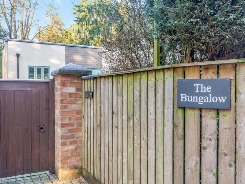 The gated entrance that welcomes you on to The Bungalow plot, which spans 0.15 of an acre.