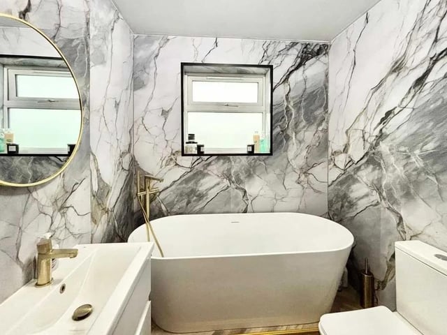 The family bathroom offers luxury in abundance with a free standing bath, shower cubicle, vanity wash basin and wc.