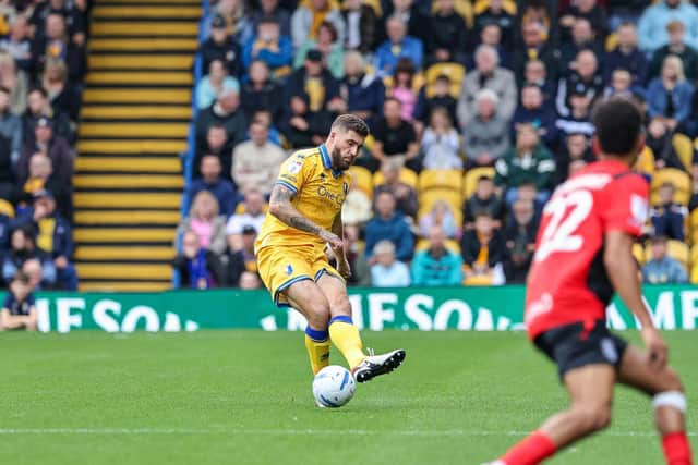 Ryan Sweeney praised the togetherness of Mansfield Town's squad after the 0-0 draw against Huddersfield Town.