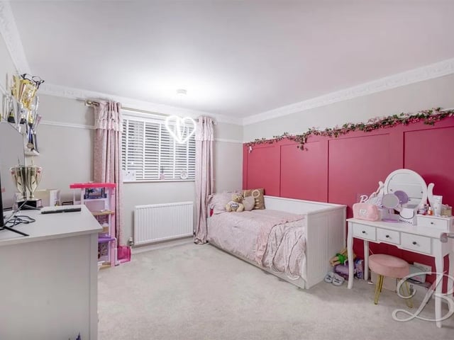 The property features five spacious bedrooms