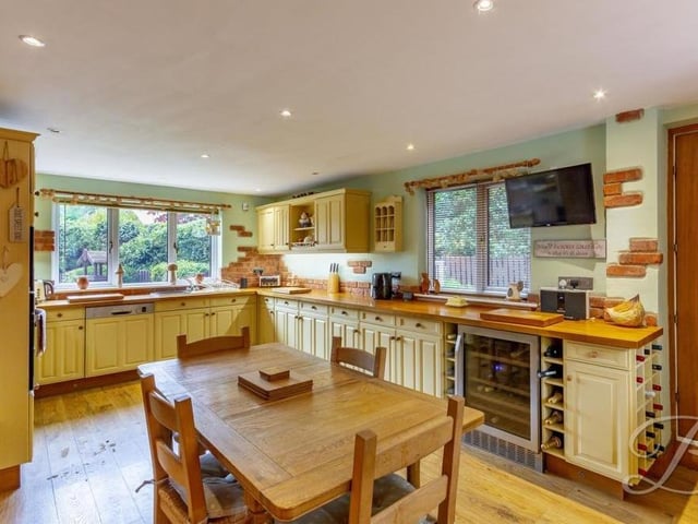 The beautifully appointed kitchen is a sublime space, featuring an extensive range of integrated appliances that include an oven, microwave and dishwasher. It is fitted with shaker-style wall and base units, a work surface, inset sink with mixer tap, wine cooler, electric hob, splashback and downlights. And we haven't even mentioned the underfloor heating and pantry!