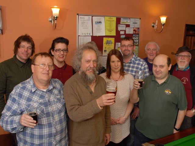Mick Bull, left, Chairman of the Mansfield and Ashfield Branch of C.A.M.R.A. toasts the success of the 23rd Mansfield Real Ale Festival at the Rufford Arms in 2013.