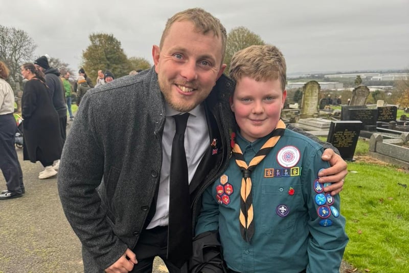 Coun Tom Hollis with a young scout at the Huthwaite Remembrance parade