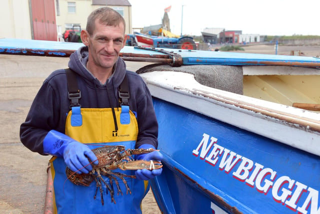 Fisher Mark Stephenson lands back onshore with his daily lobster catch.
