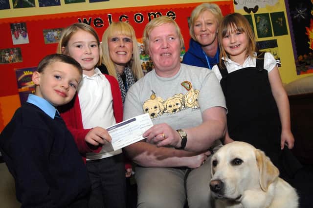 Just over two years ago, children from the Ashfield Play Care Scheme raised more than £250 for the Guide Dogs for the Blind Association.They presented a cheque to Kathleen Patten and her dog, Vogue.