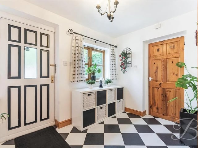 The stylish entrance hall sets the tone for the welcoming property.