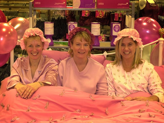 Marks and Spencer lingerie staff spent the day in bed at work in aid of breakthrough breast cancer in 2002. Left to right, Helen Challinor, Amanda Letchford and Sally Robinson in bed at the store in Meadowhall