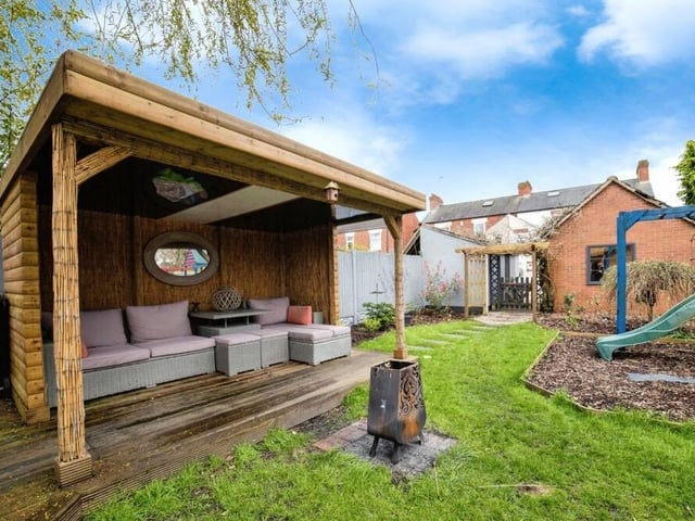The rear garden at the £220,000 Kirkby property keeps on giving. Here is a superb gazebo (or maybe a pergola) with sun lounge.