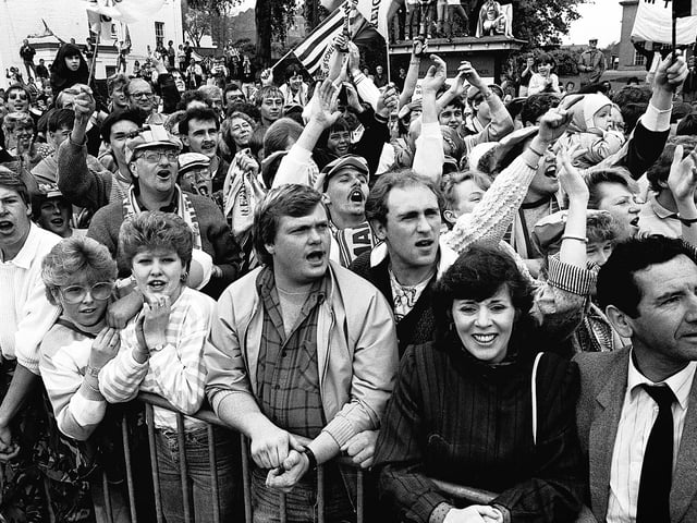 Fans waiting patiently to see the players - spot anyone you know?