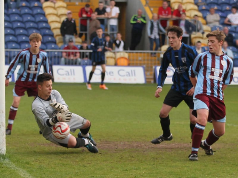 A fine save from Underwood Villa's Reece Dooley.
