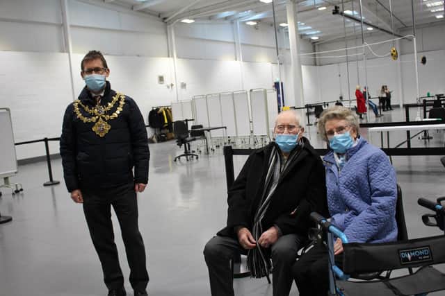 Mayor of Mansfield Andy Abrahams with Geoff and Jenny Holland after they received their Covid-19 jabs
