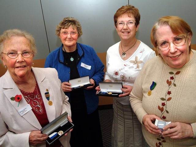 Long-serving volunteers at Kings Mill Hospital with their service medals presented at a lunch in honour of all volunteers at the Civic Centre. Pictured (left to right) are: Barbara Harpham, Dorothy Bradford, Linda Swan, Sonia Tate. Year: 2007.