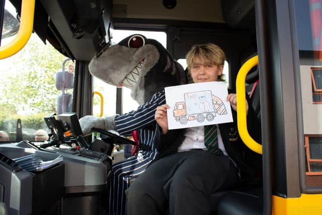 George in the cab with Sid the Shark.