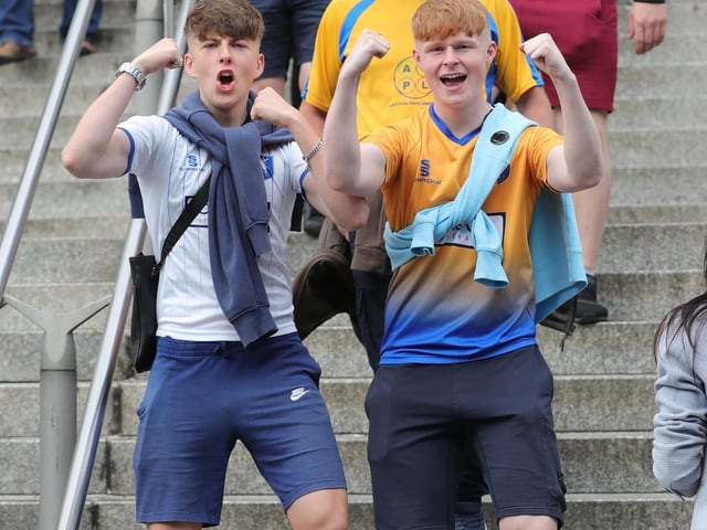 Mansfield Town fans watch the drama unfold inside Wembley.