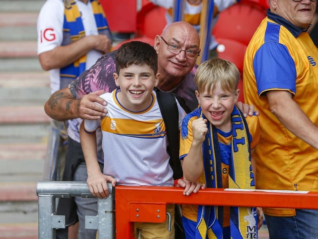 Mansfield Town fans enjoy the 3-1 win at Doncaster Rovers.