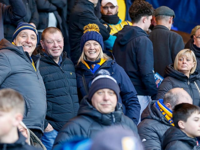 Mansfield Town fans enjoy the win at Stockport County