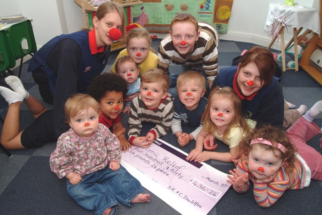 Mansfield Smarties Day Nursery raised £436.24 for Comic Relief in 2007 from baking and selling cakes, games, lucky dip and a sponsored silence which raised £191.50 of the total. Staff members Vicky Hill Tweenies Nursery Nurse, left, and Gemma Clarke Senior Nursery Nurse, right are pictured with some of the youngsters who took part.