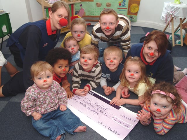 Mansfield Smarties Day Nursery raised £436.24 for Comic Relief in 2007 from baking and selling cakes, games, lucky dip and a sponsored silence which raised £191.50 of the total. Staff members Vicky Hill Tweenies Nursery Nurse, left, and Gemma Clarke Senior Nursery Nurse, right are pictured with some of the youngsters who took part.