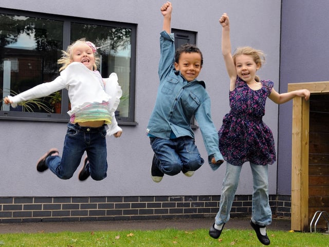 Oak Tree Primary School pupils Amelia Challis, Skye Bowen and Jermaine Smalley are all smiles after swapping their school uniform for their favourite denims to raise money for Jeans for Genes day last Frdiay.