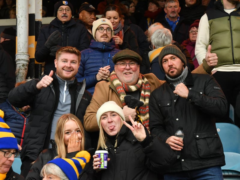 Mansfield Town fans watch the brilliant win at Peterborough United.