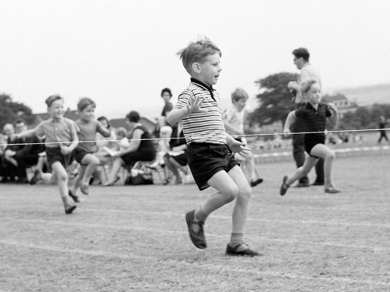 This boy prepares to cross the finishing line after victory in 1968 at Berry Hill School.