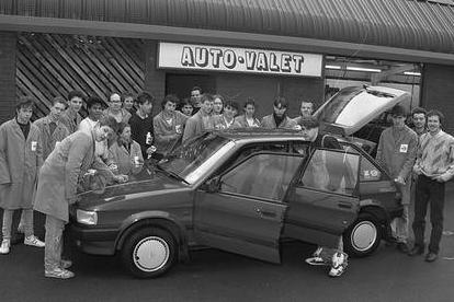 A new car is inspected back in 1989.