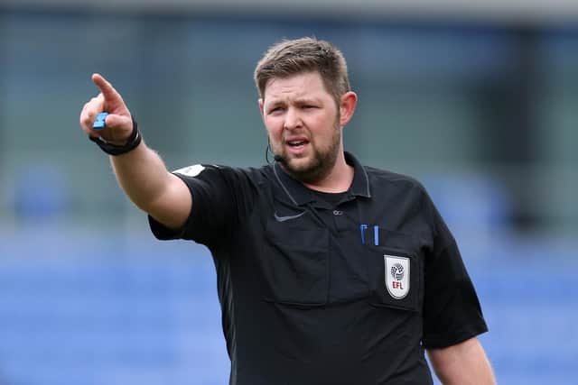 Referee Brett Huxtable called a temporary halt to proceedings in the early stages of last night's game between Mansfield Town and Scunthorpe United. (Photo by Lewis Storey/Getty Images)