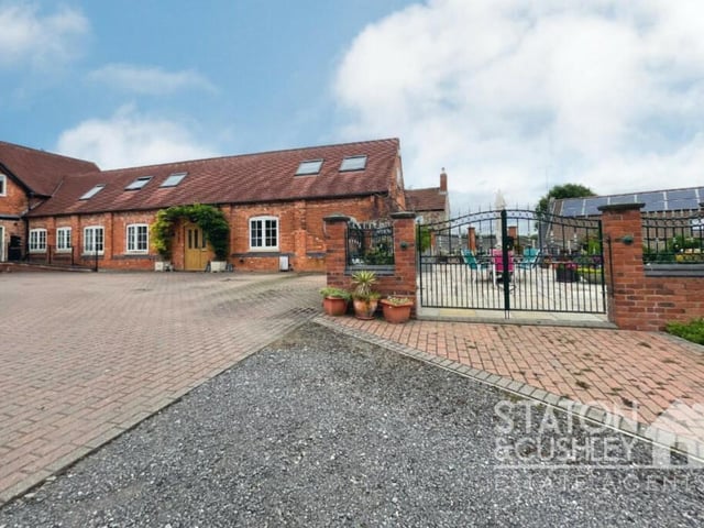 The imposing gates by the courtyard that give access to the garden.