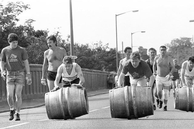 The annual Beer Barrel Race underway from Camerons Brewery to the Headland and back is pictured heading along Clarence Road.