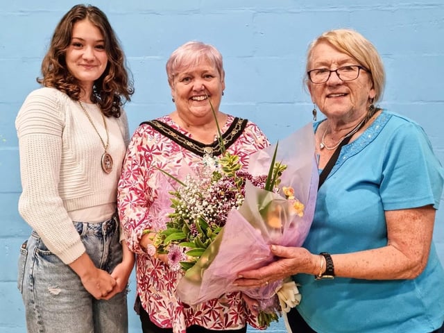 A presentation of a bouquet to Mayor Teresa Cullen by Karen Sutton, event organiser
