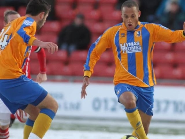 Adam Smith on the ball for Mansfield.