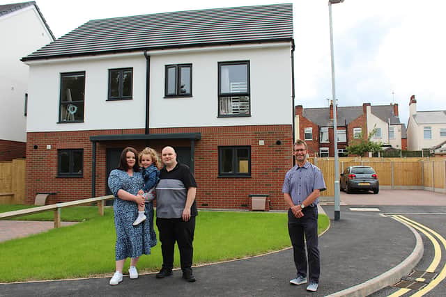 Mayor Andy Abrahams pictured with new residents