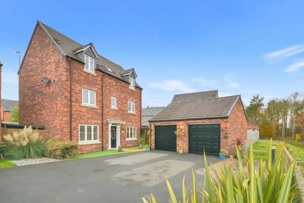 Standing proudly on Adams Park Way within the Larwood Park development in Kirkby is this four-bedroom, three-storey family home, which has just hit the market for £365,000 with estate agents JMS Sales and Lettings. Take a look inside via our photo gallery below.