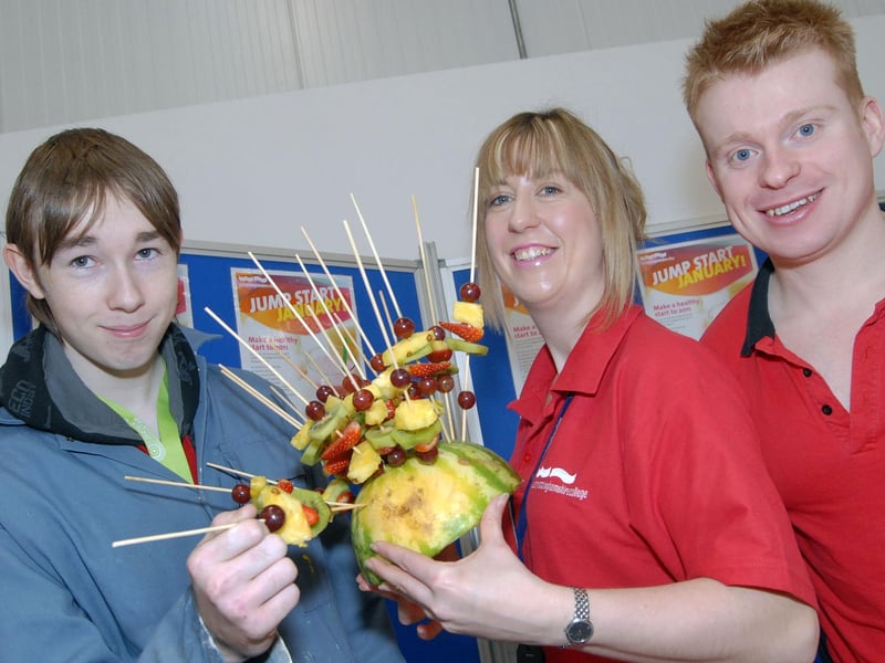 2011. Student builder Ryan Hudson went for the healthy option during Jumpstart January which was organised by the West Notts College Student Health, Welfare and Safe Guarding department, aiming to promote healthy eating and exercise amongst the construction students at their Logistics Skill Academy. The event was supported by staff from DW Sports Fitness including their assistant manager Oliver Pate, right, also pictured is student advisor Kirsty Betts.