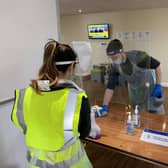 Testing booths are cleaned between each person's test to avoid cross contamination.